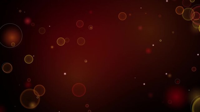 Animated bokeh particles floating across deep red gradient background creates cinematic atmosphere for holiday event motion graphics loop.