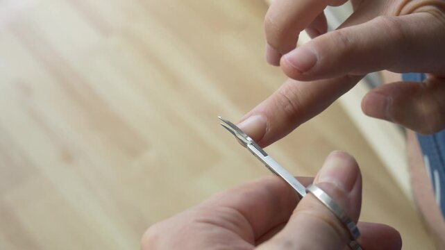 Close Up of Fingernail Cutting at Home