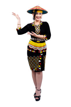 Beautiful Dayak young women in Lun Bawang traditional clothing on white background