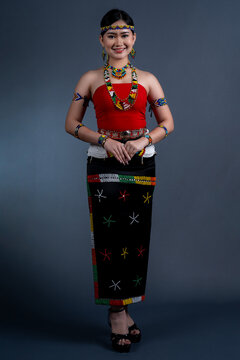 Portrait of young girl wearing a traditional cloth Simba Murut Tahol ethnic native of Sabah Borneo