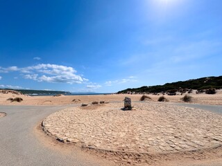 Tómbolo de Trafalgar, roundabout on the way to the famous lighthouse Faro de Trafalgar in the middle of sand dunes, Zahora, Los Caños de Meca, Vejer de la Frontera, Costa de la Luz, Spain © keBu.Medien