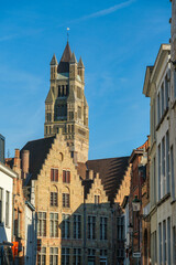Obraz premium Belfry of Bruges towering over Market Square