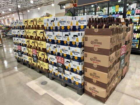  Pile of boxes of Mexican Corona brand beer for sale at a California supermarket aisle