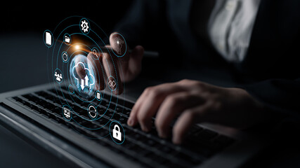 Business Professional Using Computer with Virtual Interface for Digital Communication and Security...