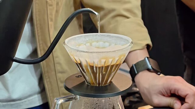 Barista pouring hot water into drip coffee filter, Cafe Drink Brewing, Beverage Making Tool, Morning Caffeine