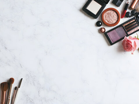 Spacious Makeup Product Flat Lay Background with Right Aligned Accessories and Central Copy Space Creates Cosmetic Campaign Layout