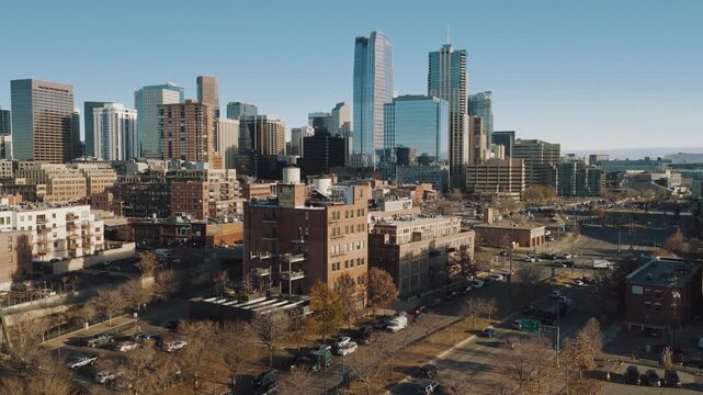 Downtown city of Denver with traffic sunny rotation drone video Denver, CO 4K