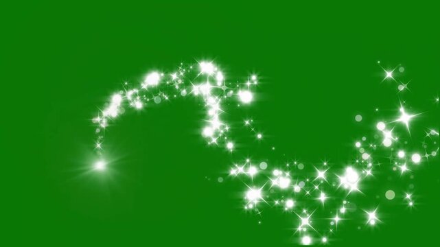 Elegant white particle beam streak with shimmering light bursts luxury star flare overlay and swirling magic dust trail for christmas celebration on green background. 4k