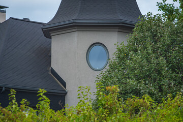 round window on ornate tower © Boriss