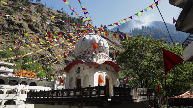 Gurudwara Sahib Manikaran Surrounded by Colorful Prayer Flags in the Himalayas