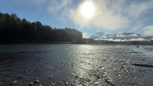 Sunrise morning on the Skagit river in the Cascades of Washington state during a fishing day with the month of September