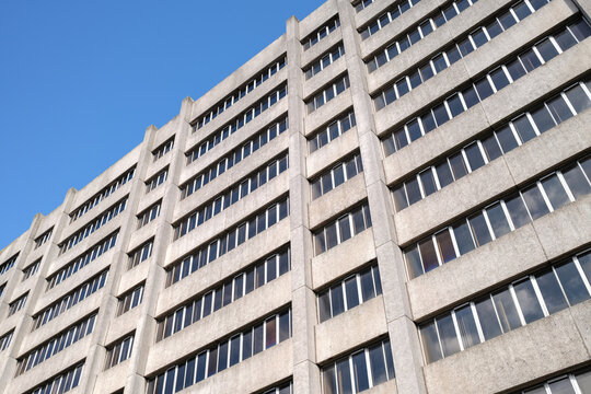 Disused and vacant office block standing against a clear blue sky in the city of Aberdeen located within Aberdeen City in the country of Scotland