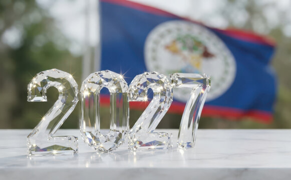 Sparkling crystal year 2027 numbers standing on a table in front of the Belize national flag