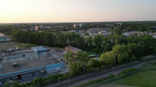 Aerial over Chatham. A rural suburban community, part of the Chatham-Kent municipality. Located in southwest Ontario, Canada. Shot on a late afternoon before sunset in spring, May, 2023.