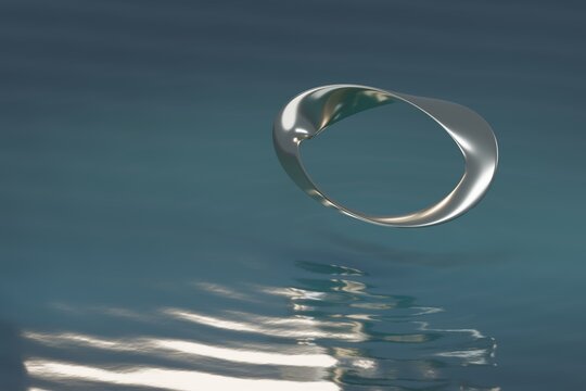 Metallic mobius strip ring levitating above calm reflective water surface in surreal 3D rendering