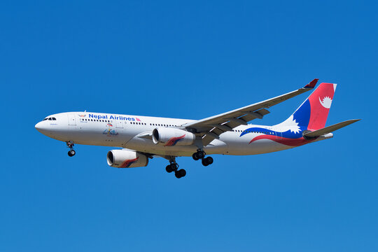 Nepal Airlines Airbus A330-200 (9N-ALZ) passenger plane approaching Narita International Airport for landing under clear blue sky