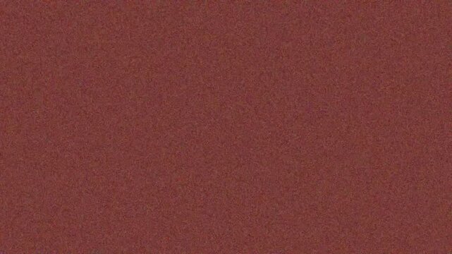 Textured red background with grainy pattern for design projects