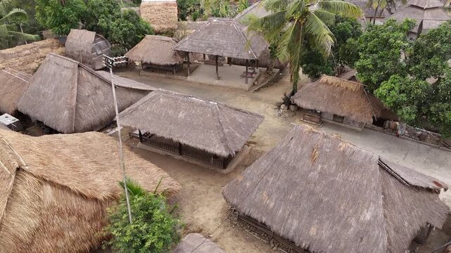 Aerial view of Sasak Ende traditional village with thatched roof houses in Lombok Indonesia