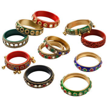 A collection of intricately designed traditional bangles in vibrant colors and ornate patterns