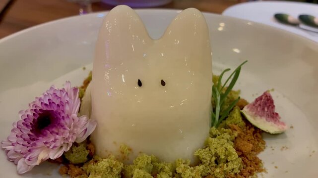 Close up of trembling Jiggly Cat dessert, traditional Korean milk pudding