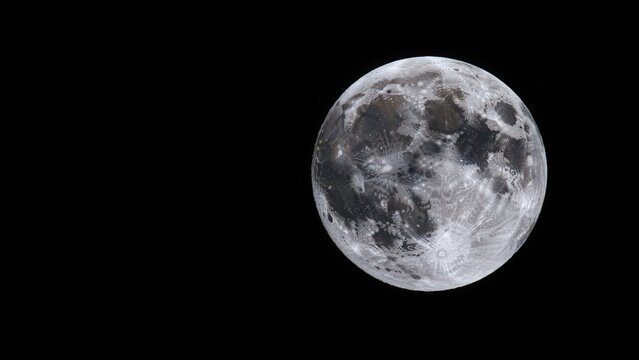 Detailed full moon in black sky, celestial object for science and space themes.