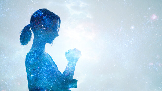 A woman meditating and the concept of mindfulness