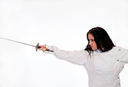 Caucasian Woman In Fencing Jacket Thrusting Frence Foil
