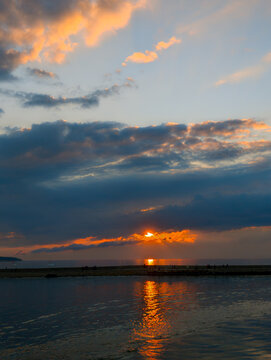 Sunset at the Harbor Entrance in Rostock-Warnem&uuml;nde (Germany)