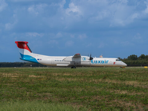Luxair De Havilland Canada Dash 8 Q400 passenger aircraft photographed at Milan Malpensa Airport MXP, Varese, Italy