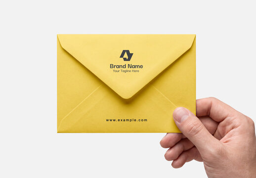 Hand Holding Envelope Mockup
