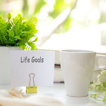 Notebook with my life goals message on notepad inspiring new beginnings and future life planning.  Goal Life Wellness Concept.