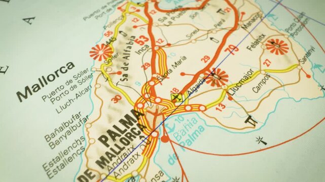 road network across mallorca to palma de mallorca, spain &ndash; gliding over atlas map