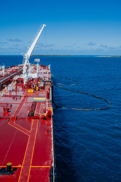 Oil Tanker Conducting Cargo Hose Transfer Operations at Offshore Single Point Mooring Terminal