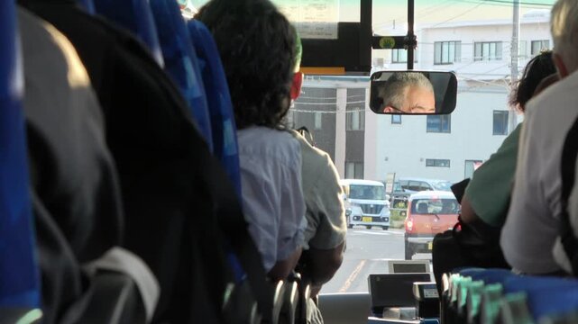 A corner of a crowded bus, Hakodate, Japan, 2026.09.09.