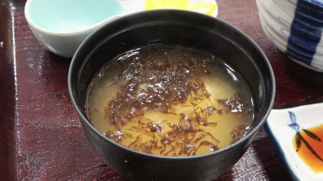 A bowl of miso soup, a common Japanese soup.