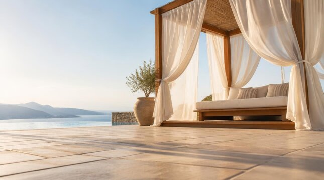 Luxury wooden gazebo with white curtains overlooking calm ocean and distant mountains