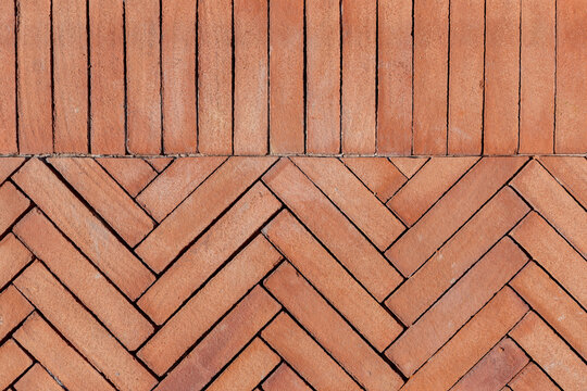 Terracotta tiles in herring bone pattern