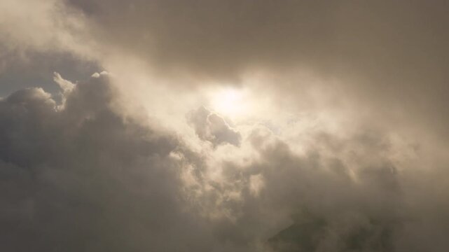 Flight above the clouds . Misty weather, view from above