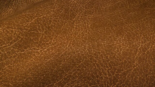 Antique Bronze Leather Waves Moving in a Seamless Looped Pattern with Metallic Inspired Texture and Rich Premium Material Character for Elegant Modern Backgrounds