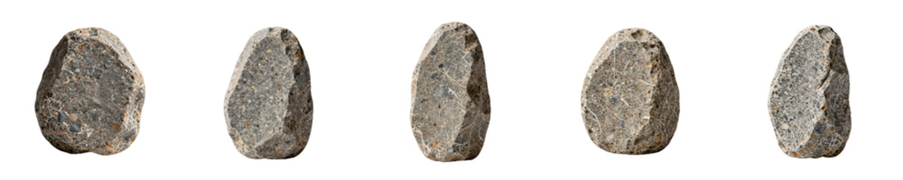Collection of five ancient paleolithic hand axes made of quartzite stone on black backdrop