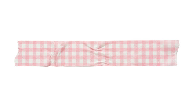 A strip of pink and white gingham patterned washi tape isolated on transparent background