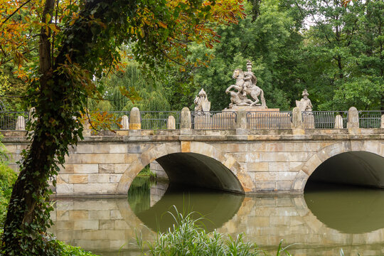 Bridge and monument in Lazienki Krolewskie Park in Warsaw