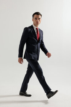 Side view of confident man walking
