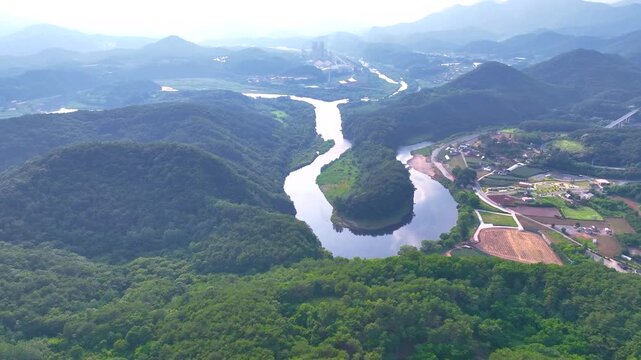 Cinematic 4K drone shot slowly flying forward over the Korean Peninsula-shaped landform in Yeongwol, Gangwon-do, South Korea.