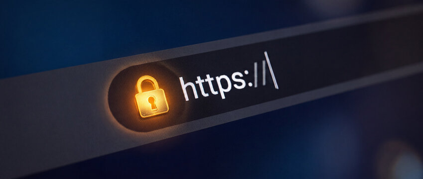 Secure connection with https padlock icon on dark digital web browser address bar, featuring glowing yellow encryption symbol for internet cybersecurity concept design