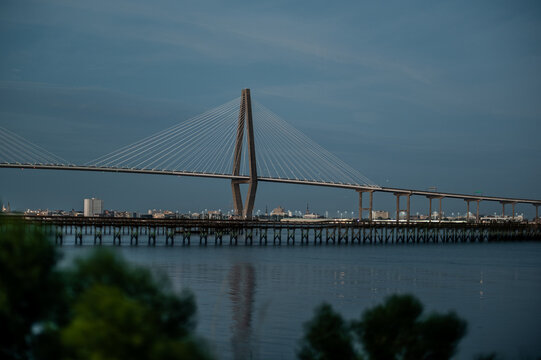 Arthur Ravenel Jr Bridge reflection over calm water