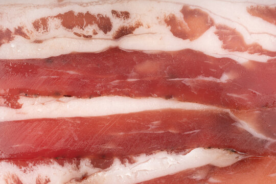 Cured carbonara pork macro background