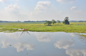 Landscape and villages on Majuli (also spelled Majoli)  the largest river island in Assam and the world's largest inland river island, a state in Northeast India.  © robnaw