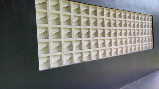 Modern architectural wall with ventilation roster block pattern