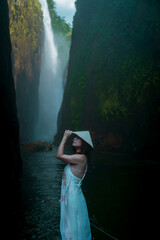 Contemplative side profile portrait of woman wearing conical hat, Muong Hum, Lao Cai, Vietnam © nhat.photograph